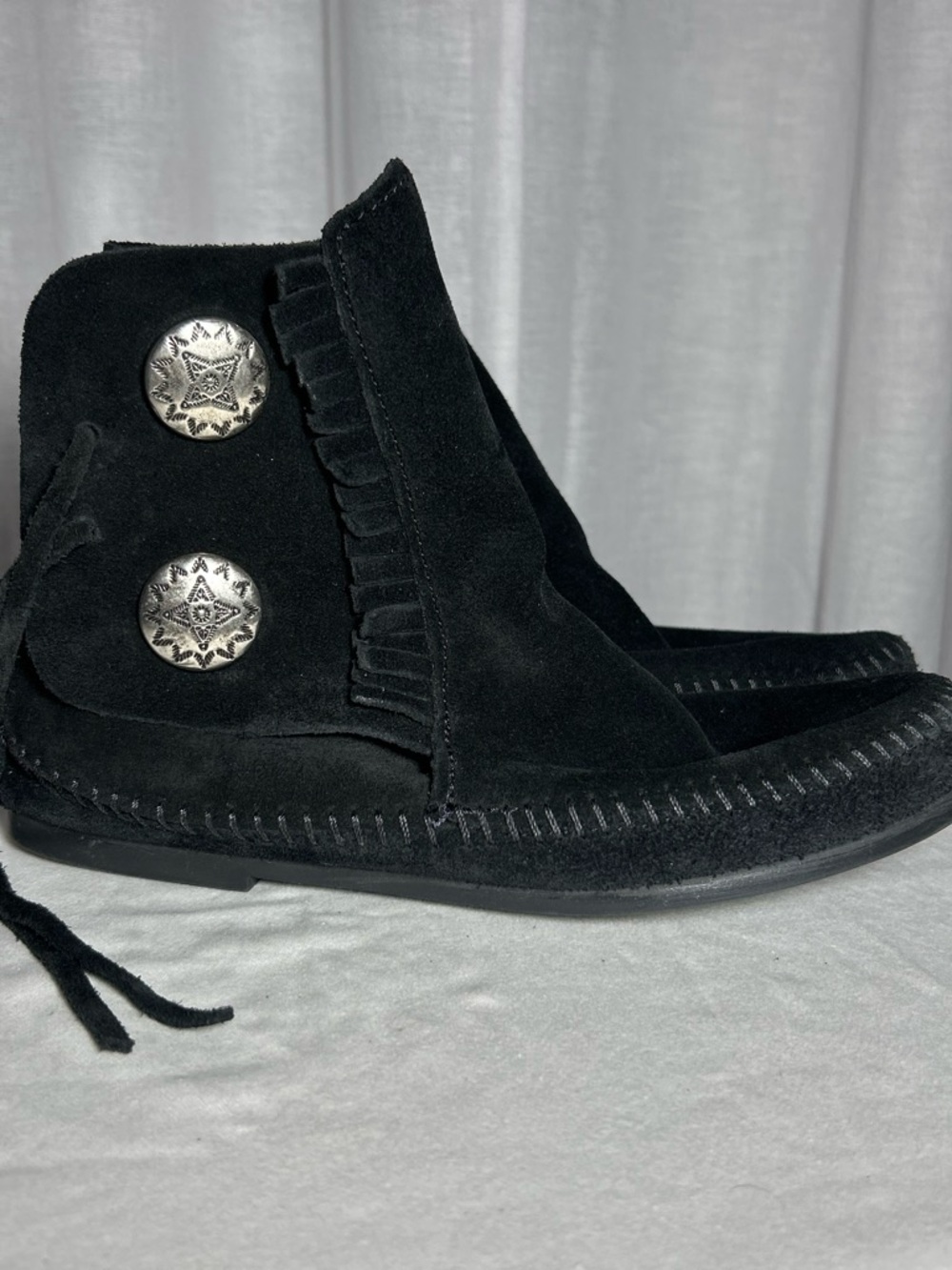 Minnetonka Black Suede Fringe Ankle Boots with Decorative Silver Conchos